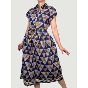 toast linen dress maplestore | Toast Pleated Organic Cotton Linen Dress, simplicity meets structure, styled over the Stripe Linen Cotton Barrel Leg Trousers. Shop Toast